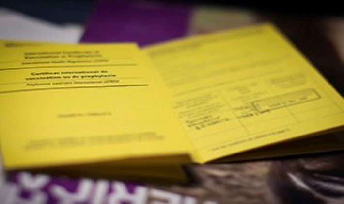 traveler getting vaccination shot - Find a Clinic | Travelers' Health | CDC