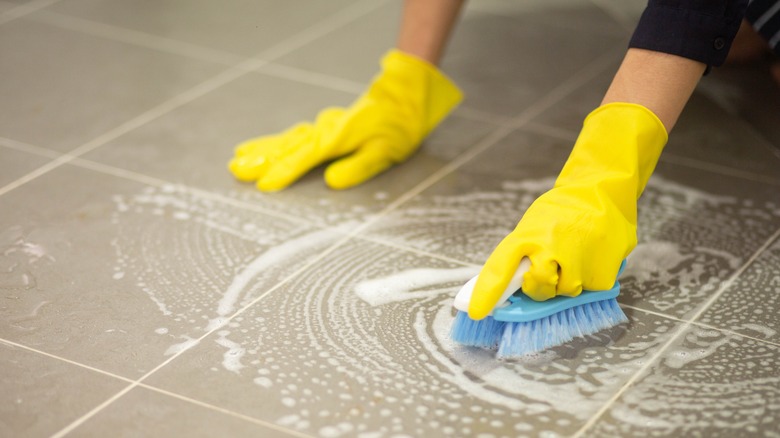 scrubbing bathroom floor - The Popular Cleaning Item That Will Damage Your Ceramic Tile Floors
